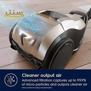 یک جاروبرقی الکترولوکس با نام تجاری مه سنتر با یک جلوپنجره گرد و یک دسته.
