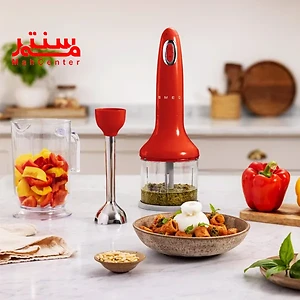 گوشت کوب برقی اسمگ مدل hbf03 قرمز در فضای آشپزخانه که پایه گوشتکوب کنار ظرف خردکن قرار دارد و جلوی آن یک بشقاب پاستا
